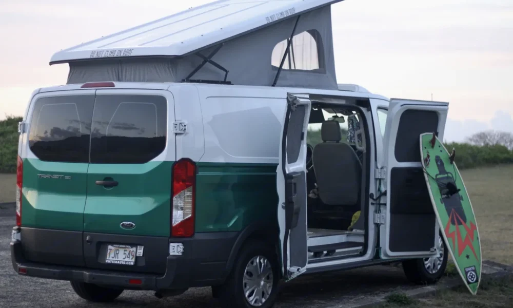 2017 Ford Transit Big T camper van in Honolulu, Hawaii. This 19-foot camper van sleeps up to 4 guests with two full-size beds, accommodates 4 passengers, has a 4.8-star rating from 195 trips, does not have a generator, and is not pet-friendly.