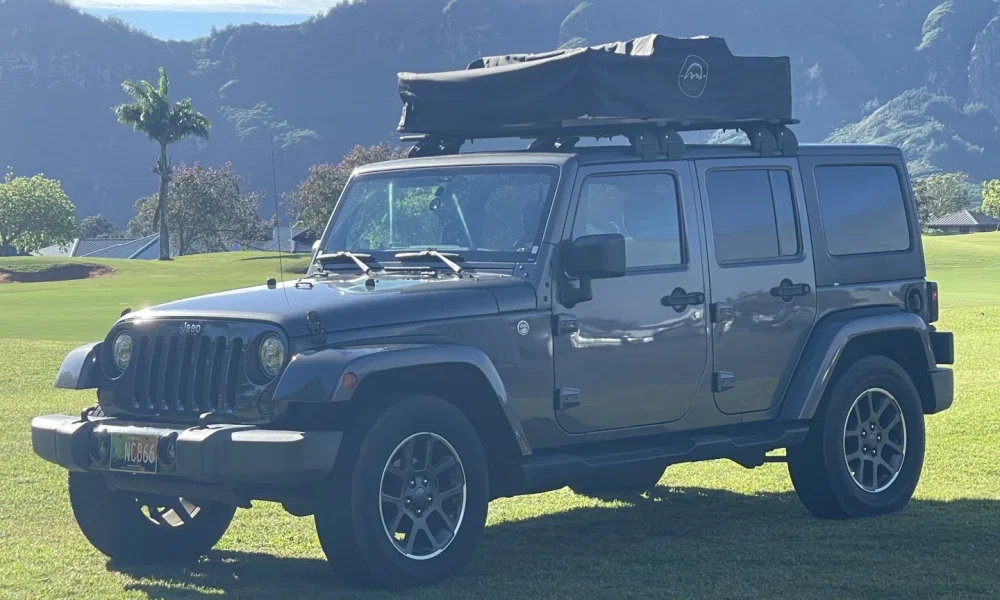 2018 Charcoal Wrangler Jeep truck camper in Lihue, Hawaii. This 20-foot camper has a 5.0-star rating from 1 review, does not include a generator, and is not pet-friendly.