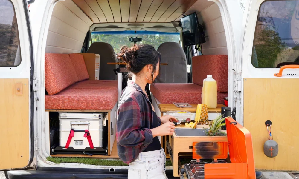 Andy camper van in Honolulu, Hawaii. This 18-foot camper van sleeps 2 guests with a full-size bed, has a 5.0-star rating from 31 trips, offers unlimited mileage, does not have a generator, and is not pet-friendly.