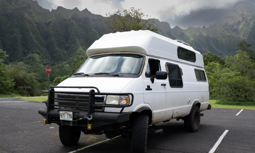Da Big Kahuna Class B camper van in Honolulu, Hawaii. This 20-foot camper sleeps 2 guests with a queen-size bed, has a 4.8-star rating from 21 trips, is pet-friendly, offers delivery within 25 miles, includes unlimited mileage, and does not have a generator.