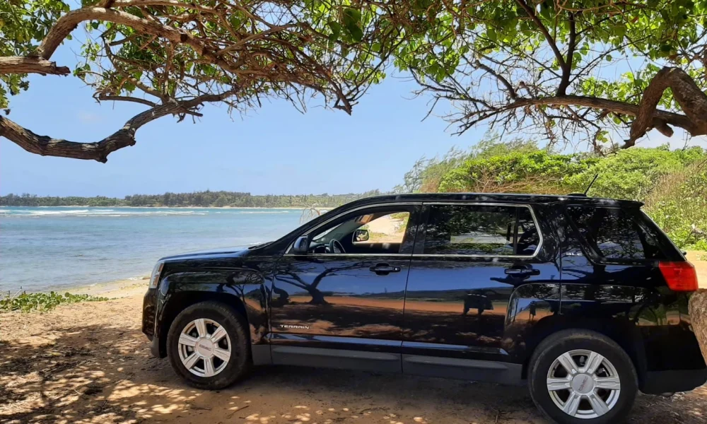 GMC Honeylane Kailani truck camper in Kapaʻa, Hawaii. This 15-foot camper sleeps 2 guests, accommodates up to 5 passengers, has a 4.9-star rating from 31 reviews, offers unlimited mileage, and is not pet-friendly.