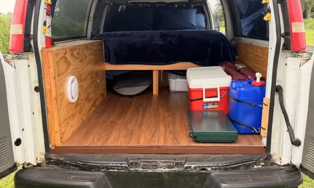 Handcrafted Stealth camper van in Kilauea, Hawaii. This 20-foot camper van sleeps 2 guests with a queen-size bed, offers delivery within 50 miles, includes unlimited mileage, does not have a generator, and is not pet-friendly.
