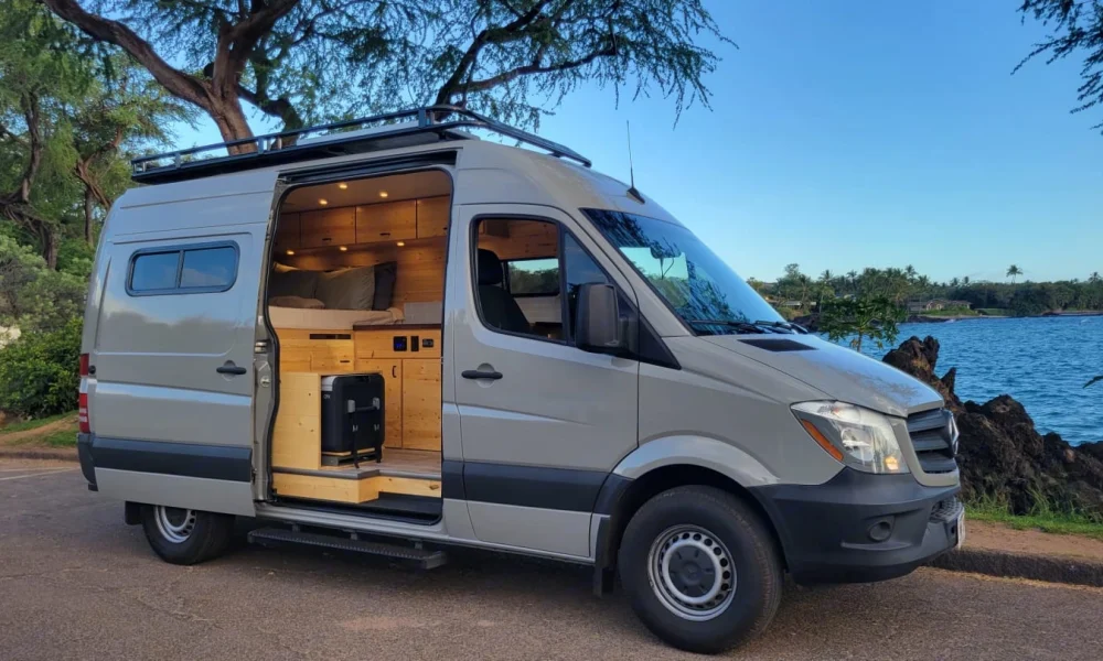 Karma, an off-grid Mercedes-Benz Sprinter camper van in Kahului, Hawaii. This 19-foot camper van sleeps 2 guests, has a 5.0-star rating from 53 trips, offers delivery within 30 miles, includes unlimited mileage and unlimited generator hours, and is not pet-friendly.