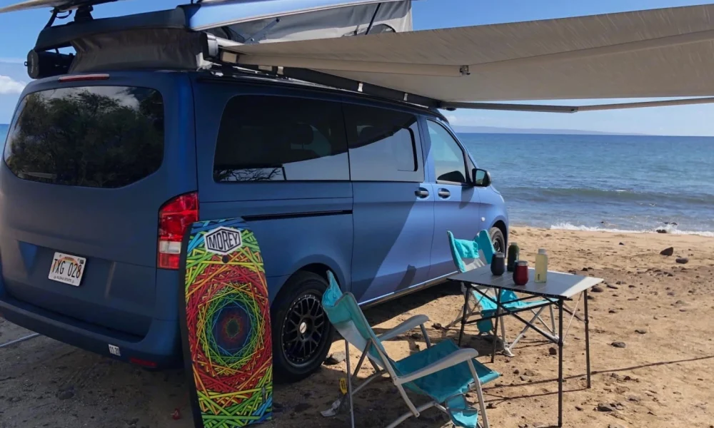 Pipeline camper van in Kaneohe, Hawaii. This 17-foot camper van sleeps up to 4 guests with one queen-size bed and one twin bed, accommodates up to 5 passengers, has a 5.0-star rating from 131 trips, does not have a generator, and is not pet-friendly.