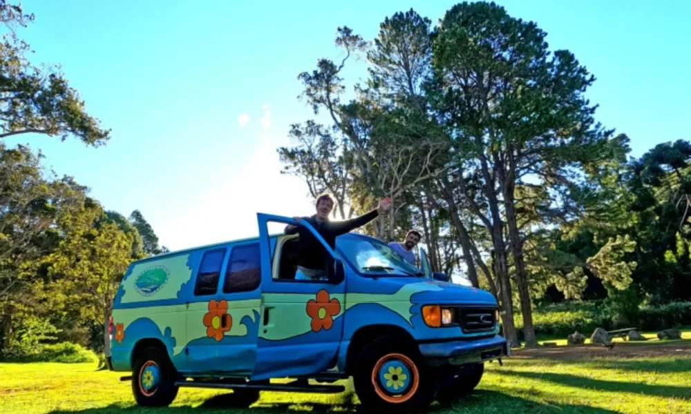 ScooBee camper van in Kapaʻa, Hawaii. This 17-foot camper van sleeps 2 guests in a full-size bed, has a 5.0-star rating from 2 reviews, offers unlimited mileage, and is not pet-friendly.